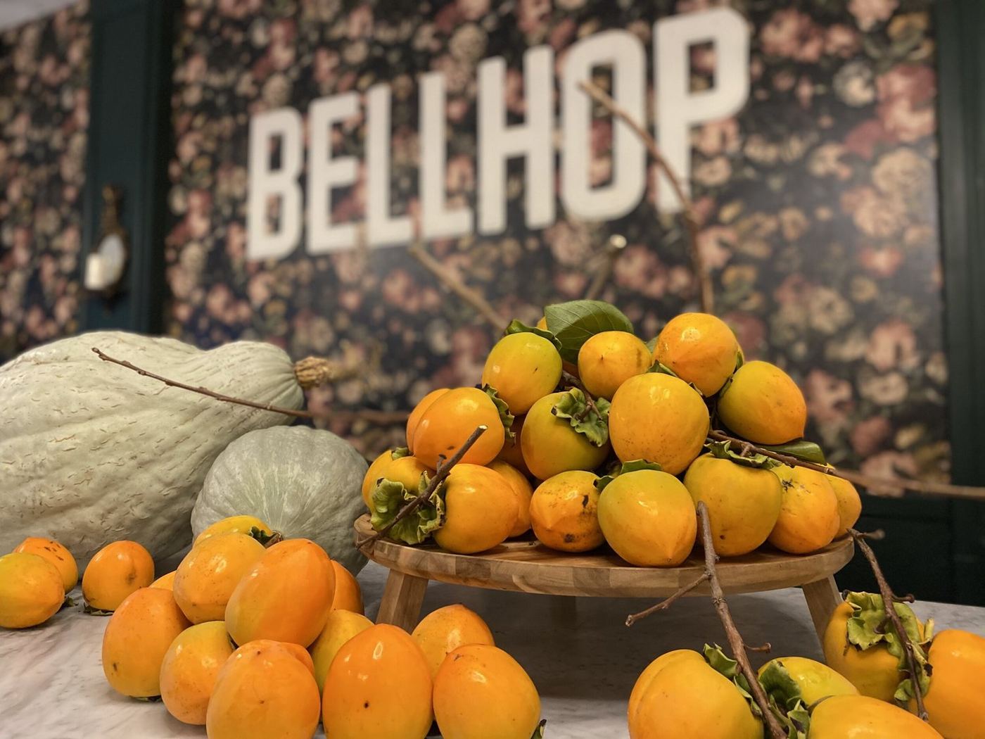 Citrus stacked against the Bellhop wall